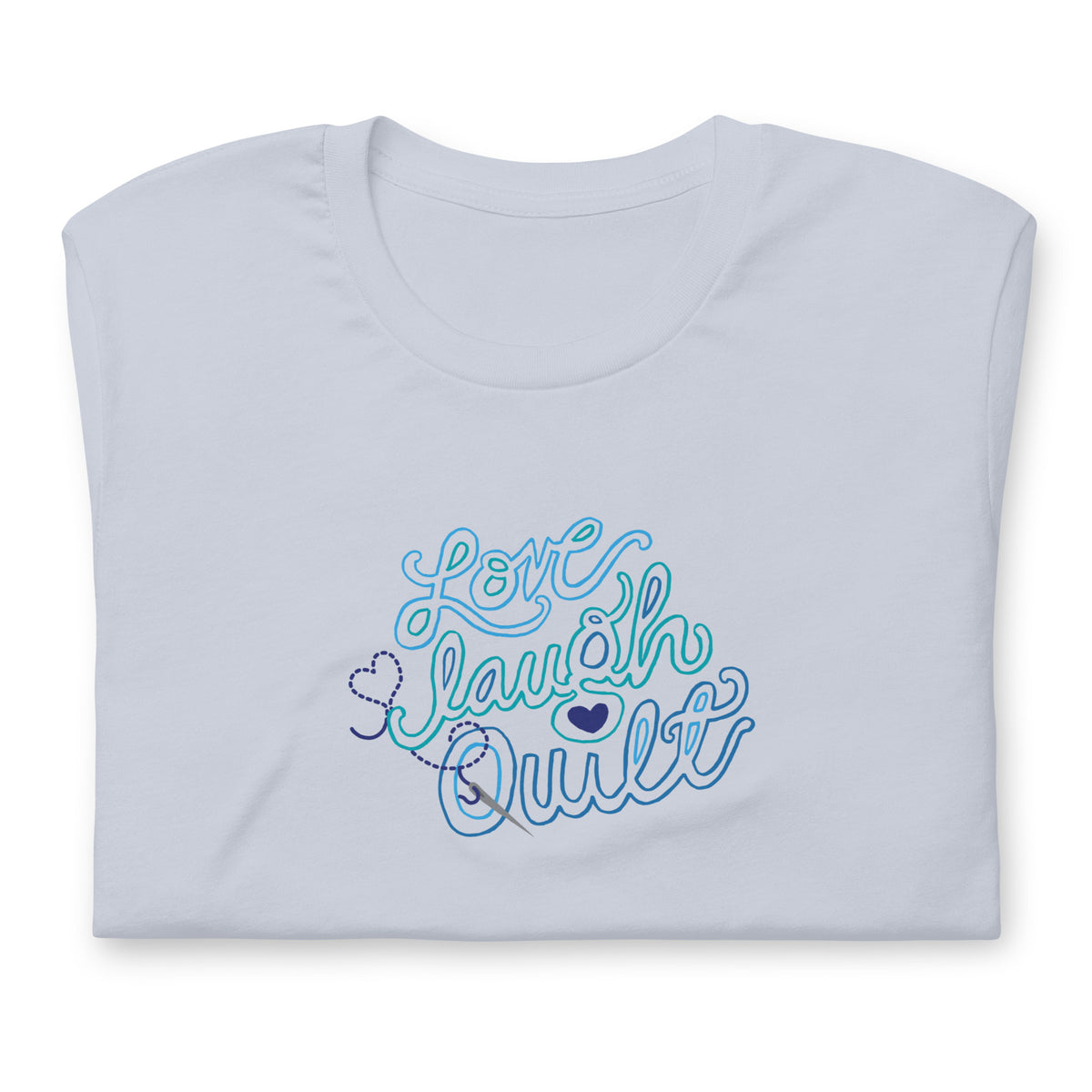 Love Laugh Quilt hand-lettered quilting design on a t-shirt in light blue, folded close-up of the design – Kate Spain design