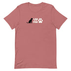 Law of the Paw® logo with seated dog and paw print on a t-shirt in mauve, front view – Kate Spain design