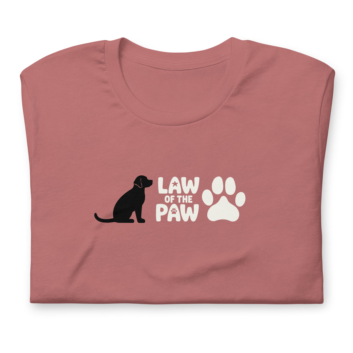 Law of the Paw® logo with seated dog and paw print on a t-shirt in mauve, folded close-up of the design – Kate Spain design