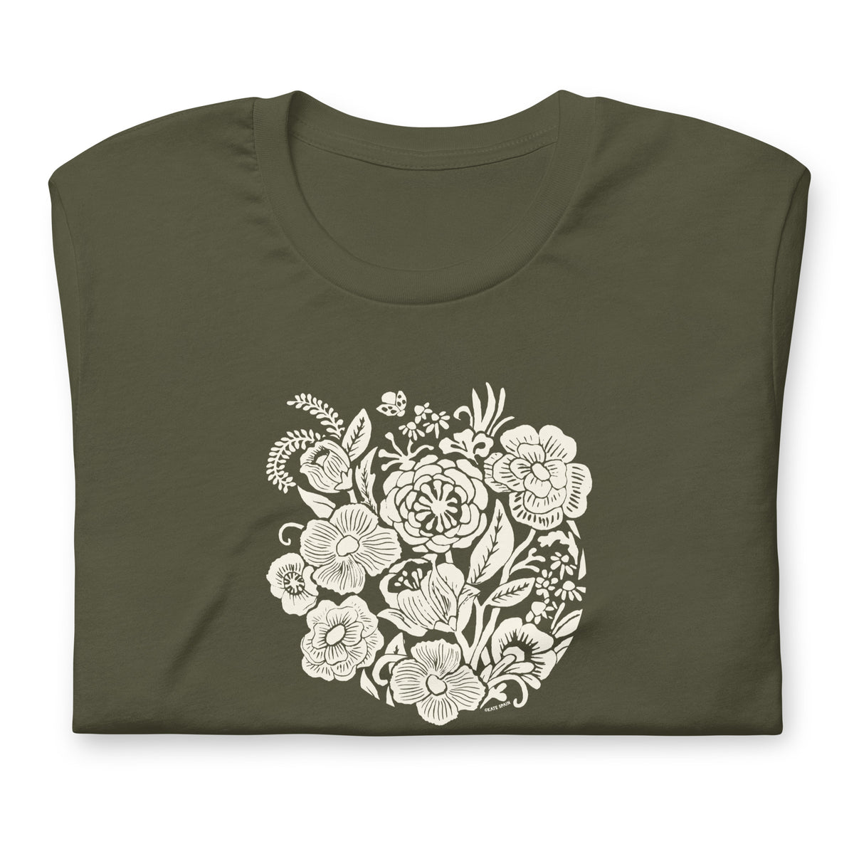 Meadowsweet woodblock-style bouquet of wildflowers on a t-shirt in military green, folded close-up of the design – Kate Spain design
