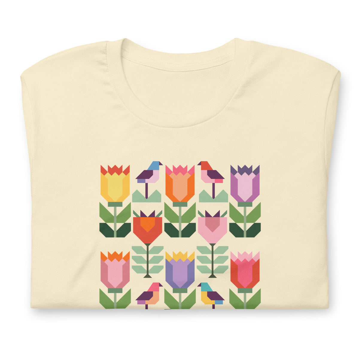 Birds + Blooms patchwork tulips and birds on a t-shirt in vintage white, folded close-up of the design – Kate Spain design for Pat Sloan
