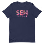 Sew Thankful patchwork lettering with a heart-topped thread spool on a t-shirt in navy, front view – Kate Spain design for Pat Sloan