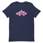 Pink GeoFlora hexagon flowers in pinks, mauves and sage on a t-shirt in navy, front view – Kate Spain design for Pat Sloan