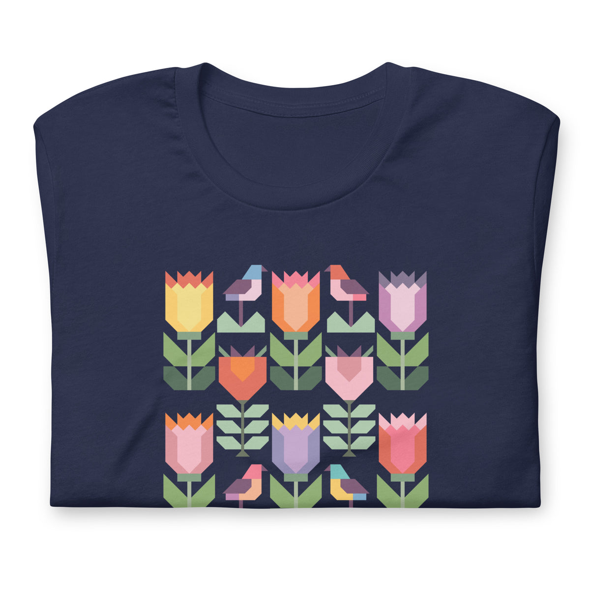 Birds + Blooms patchwork tulips and birds on a t-shirt in navy, folded close-up of the design – Kate Spain design for Pat Sloan