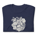 Meadowsweet woodblock-style bouquet of wildflowers on a t-shirt in navy, folded close-up of the design – Kate Spain design