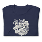 Meadowsweet woodblock-style bouquet of wildflowers on a t-shirt in navy, folded close-up of the design – Kate Spain design