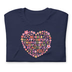 Be You floral heart of inspirational words on a staple t-shirt in navy, folded close-up of the design – Kate Spain design