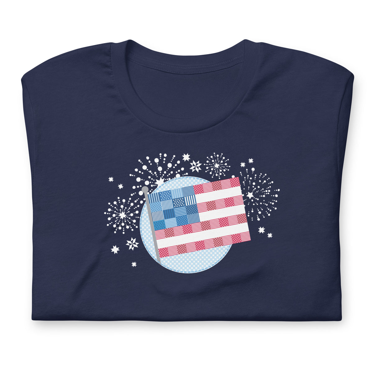 Patchwork Flag quilt-style flag with fireworks on a staple t-shirt in navy, folded close-up of the design – Kate Spain design for Pat Sloan