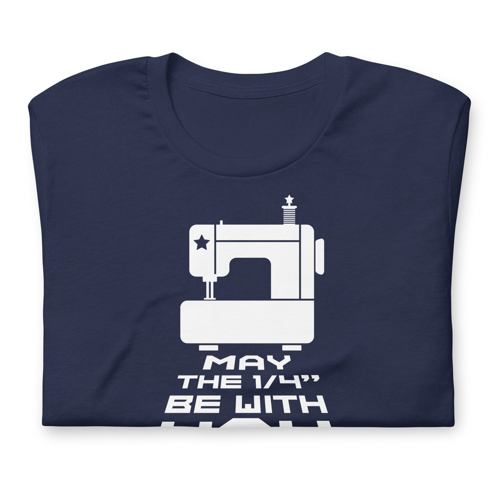 May the ¼" Be With You white sewing machine graphic on a staple t-shirt in navy, folded close-up of the design – Kate Spain design for Pat Sloan