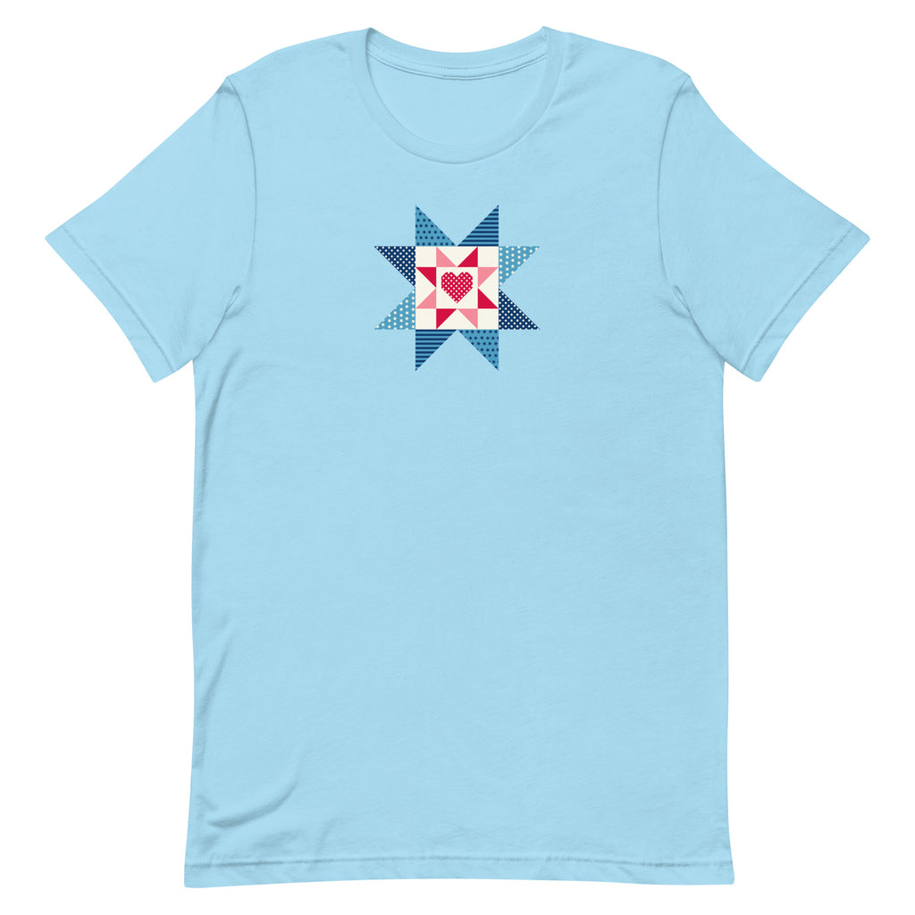 Liberty Love star quilt block with a heart in red, white and blue on a t-shirt in ocean blue, front view – Kate Spain design for Pat Sloan