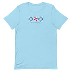 Firecracker quilt-block stars with script lettering in red, white and blue on a t-shirt in ocean blue, front view – Kate Spain design for Pat Sloan