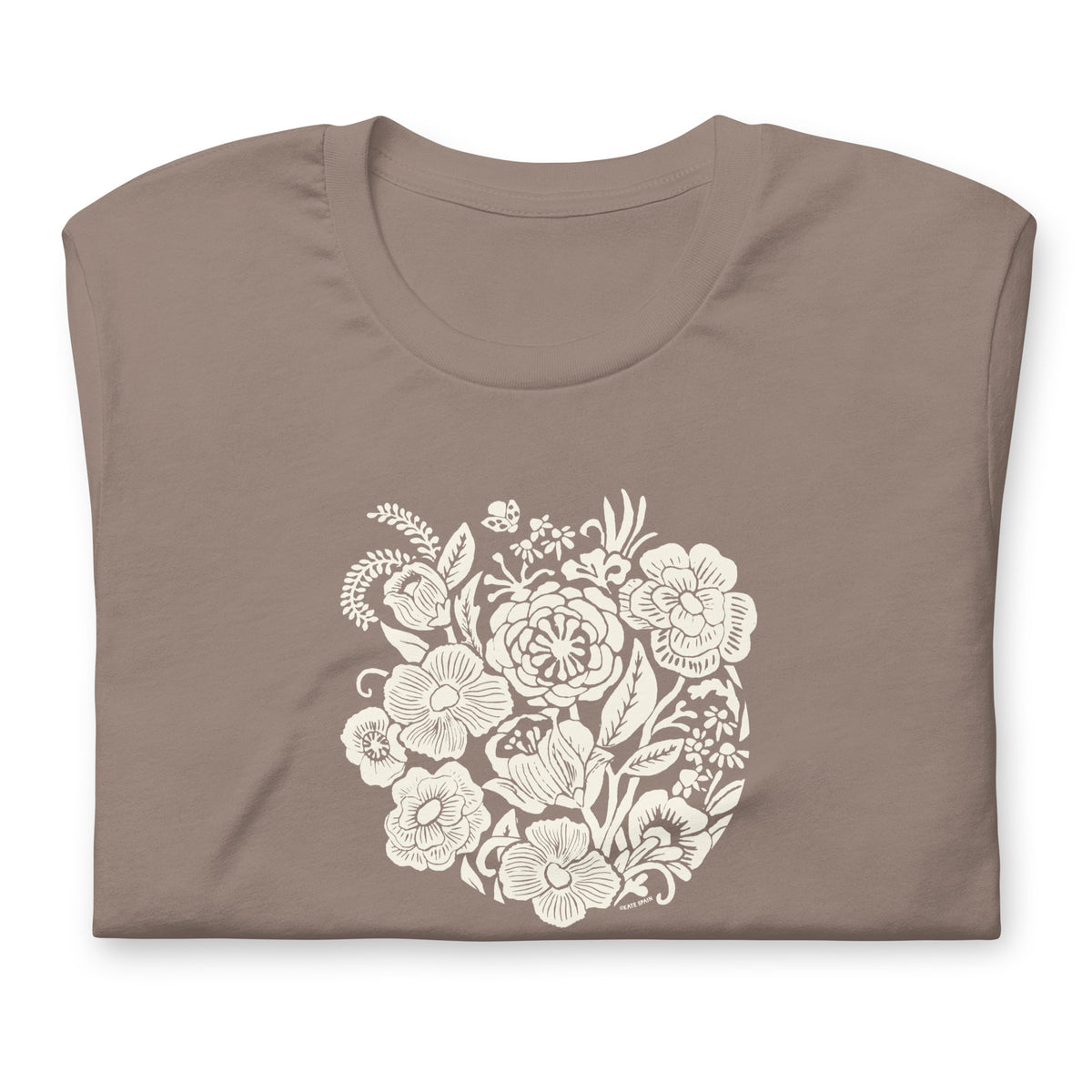 Meadowsweet woodblock-style bouquet of wildflowers on a t-shirt in pebble, folded close-up of the design – Kate Spain design