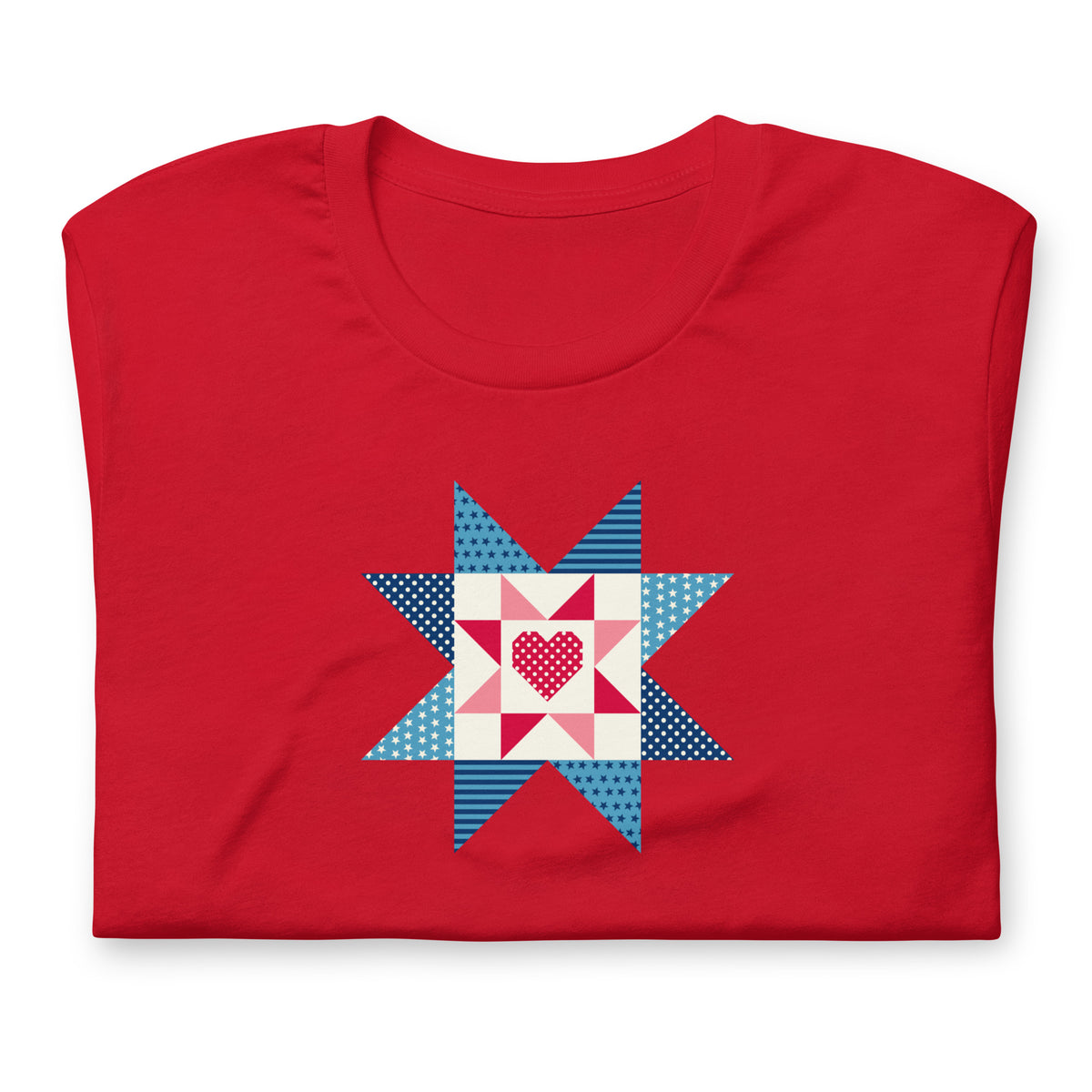 Liberty Love star quilt block with a heart in red, white and blue on a t-shirt in red, folded close-up of the design – Kate Spain design for Pat Sloan