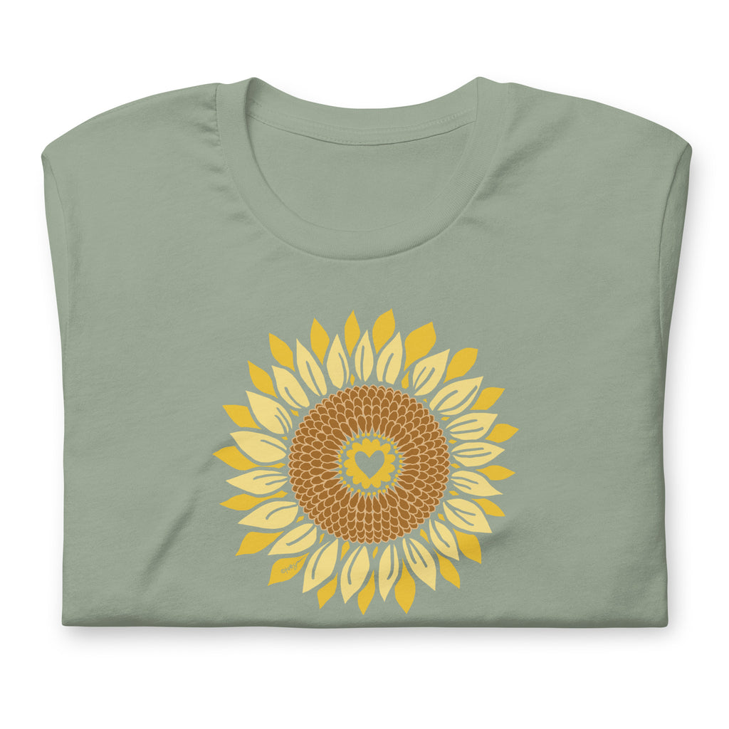 Golden sunflower with a heart center on a crewneck t-shirt in sage, folded close-up of the design – Sunflowers in My Heart by Kate Spain