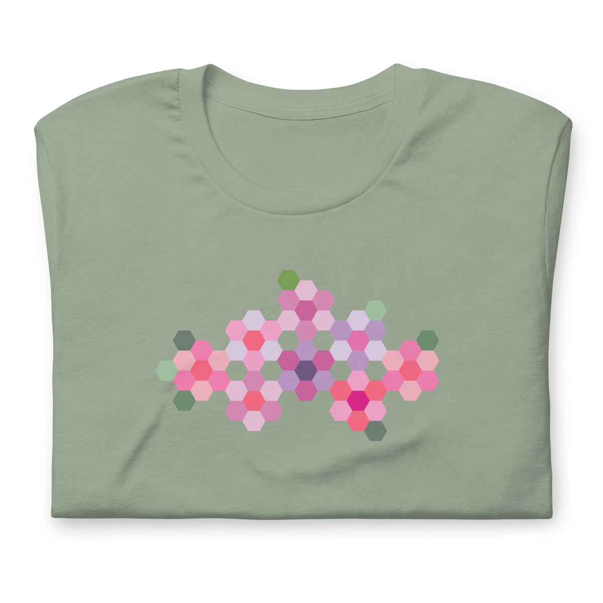Pink GeoFlora hexagon flowers in pinks, mauves and sage on a t-shirt in sage, folded close-up of the design – Kate Spain design for Pat Sloan