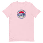 Fabric Curator Society of Stashers badge with a tomato pincushion on a t-shirt in pink, front view – Kate Spain design for Pat Sloan
