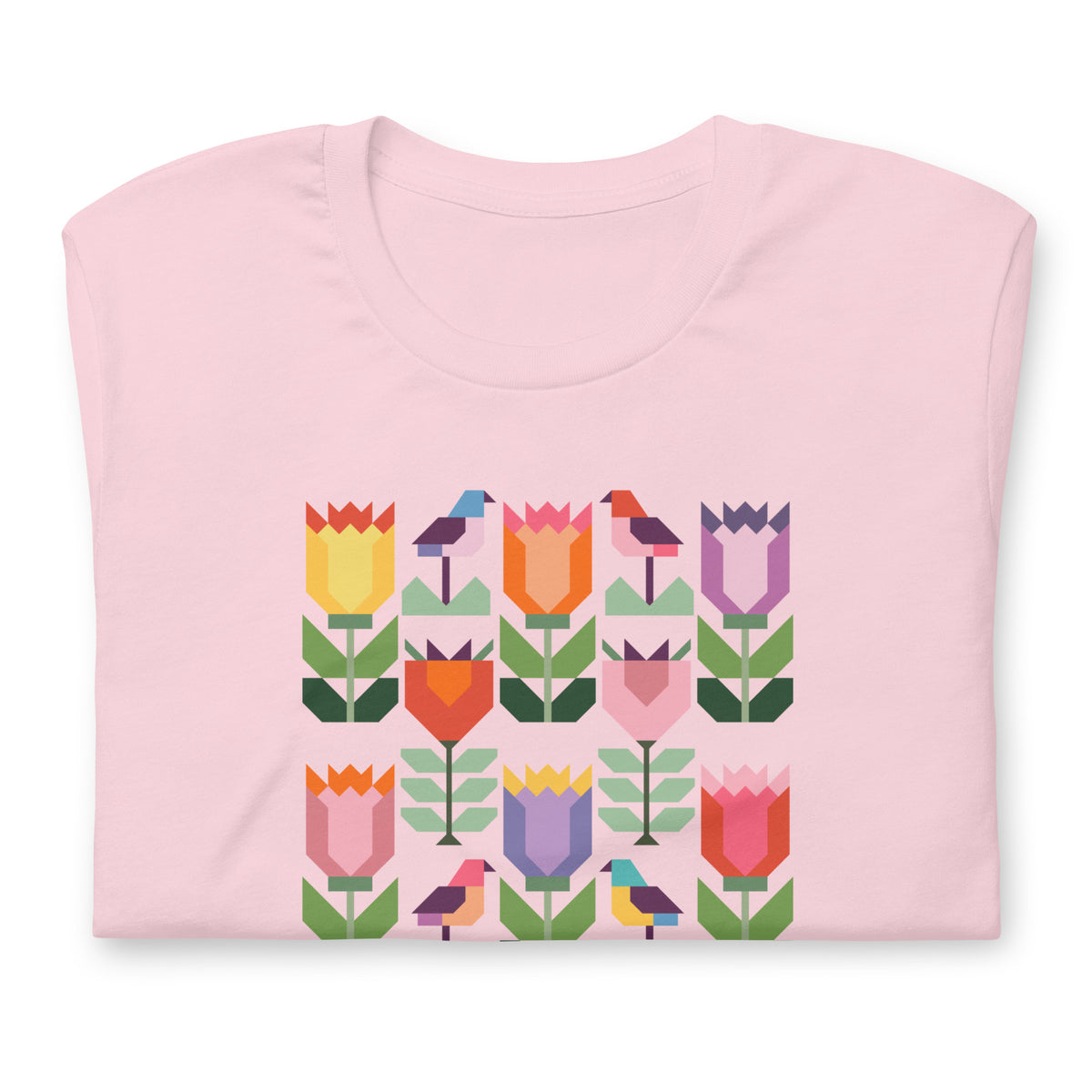 Birds + Blooms patchwork tulips and birds on a t-shirt in pink, folded close-up of the design – Kate Spain design for Pat Sloan