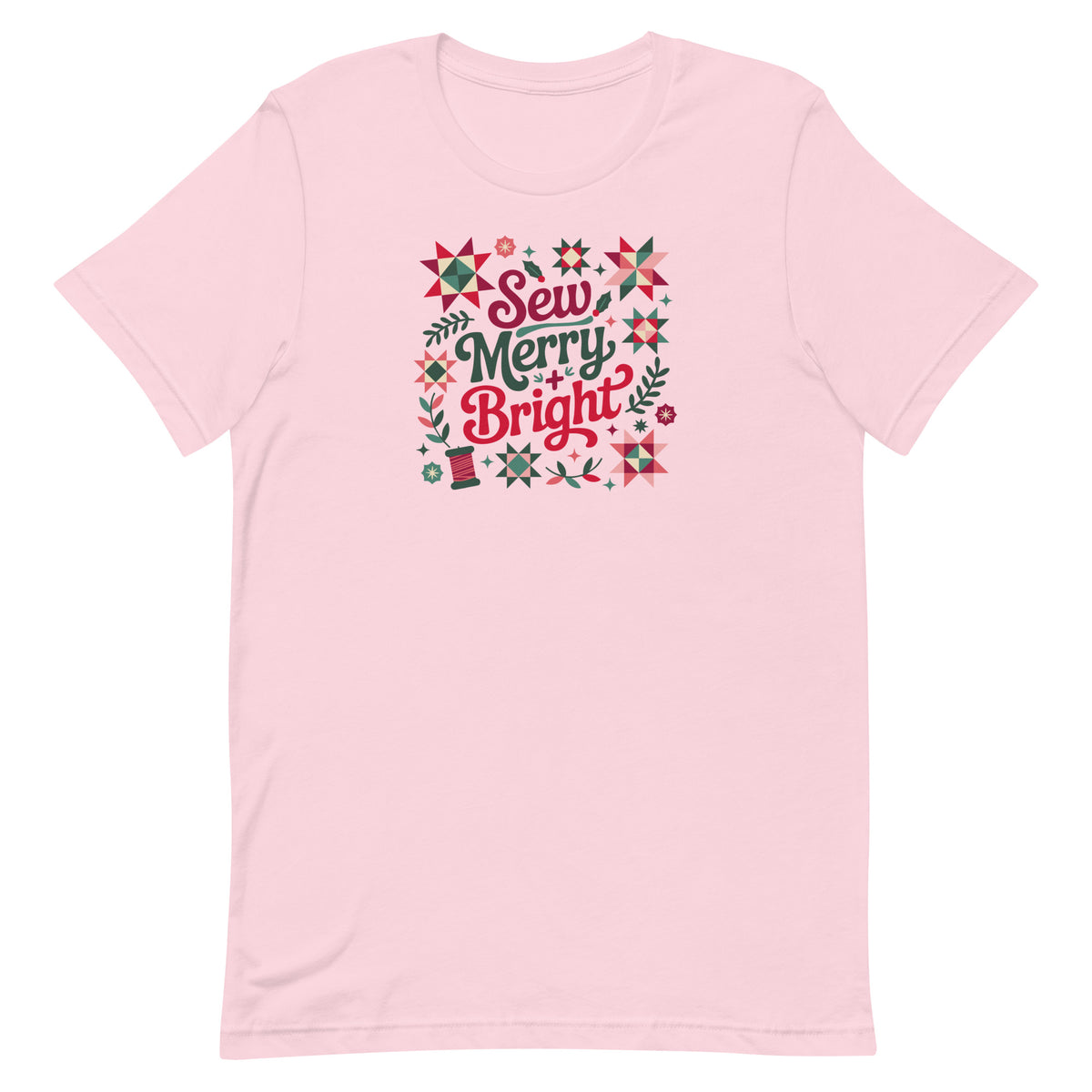 Sew Merry + Bright lettering with quilt stars and holly on a staple t-shirt in soft pink, front view – Kate Spain design for Pat Sloan