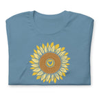 Golden sunflower with a heart center on a crewneck t-shirt in steel blue, folded close-up of the design – Sunflowers in My Heart by Kate Spain