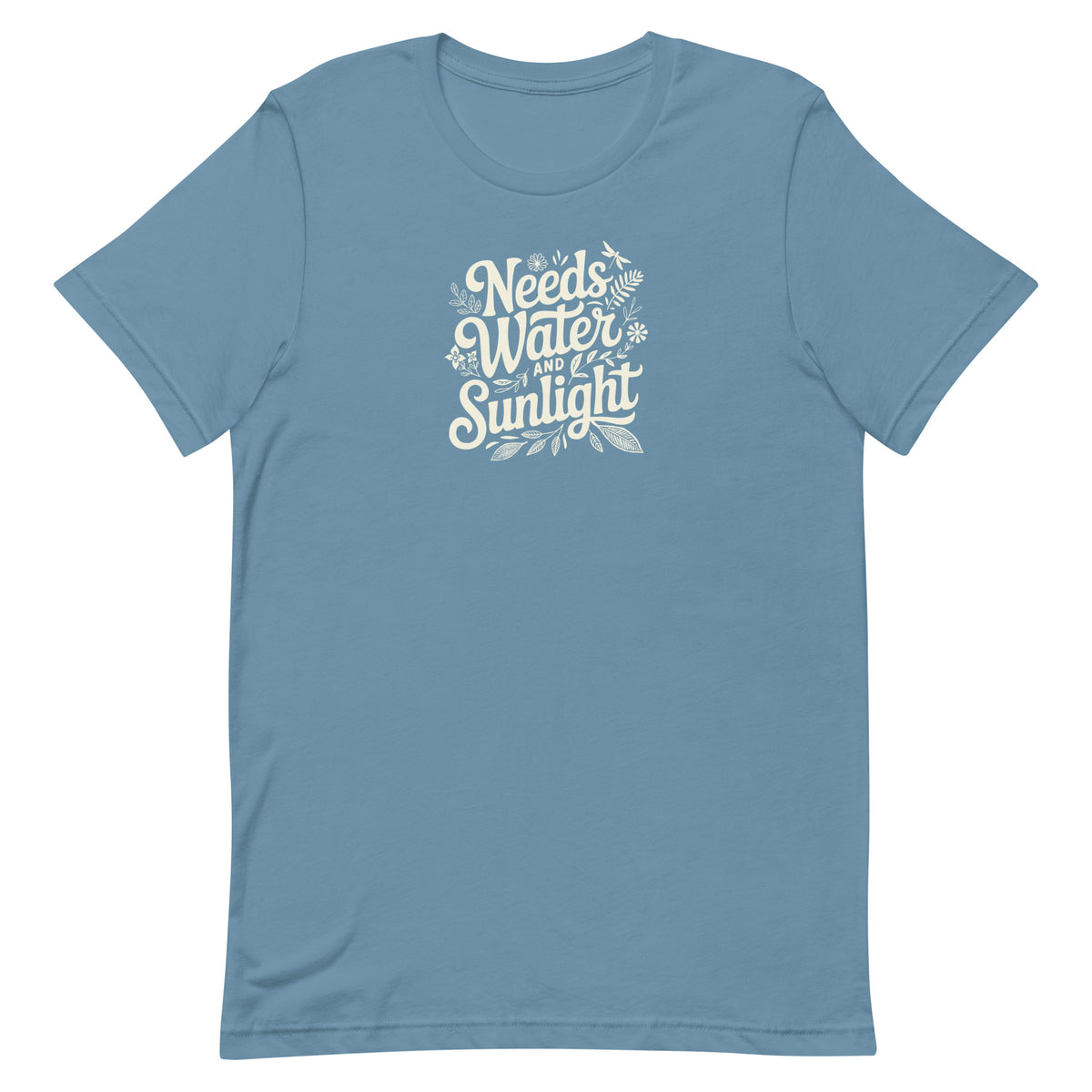 Needs Water + Sunlight hand lettering with leaf and sun accents on a t-shirt in steel blue, front view – Kate Spain design