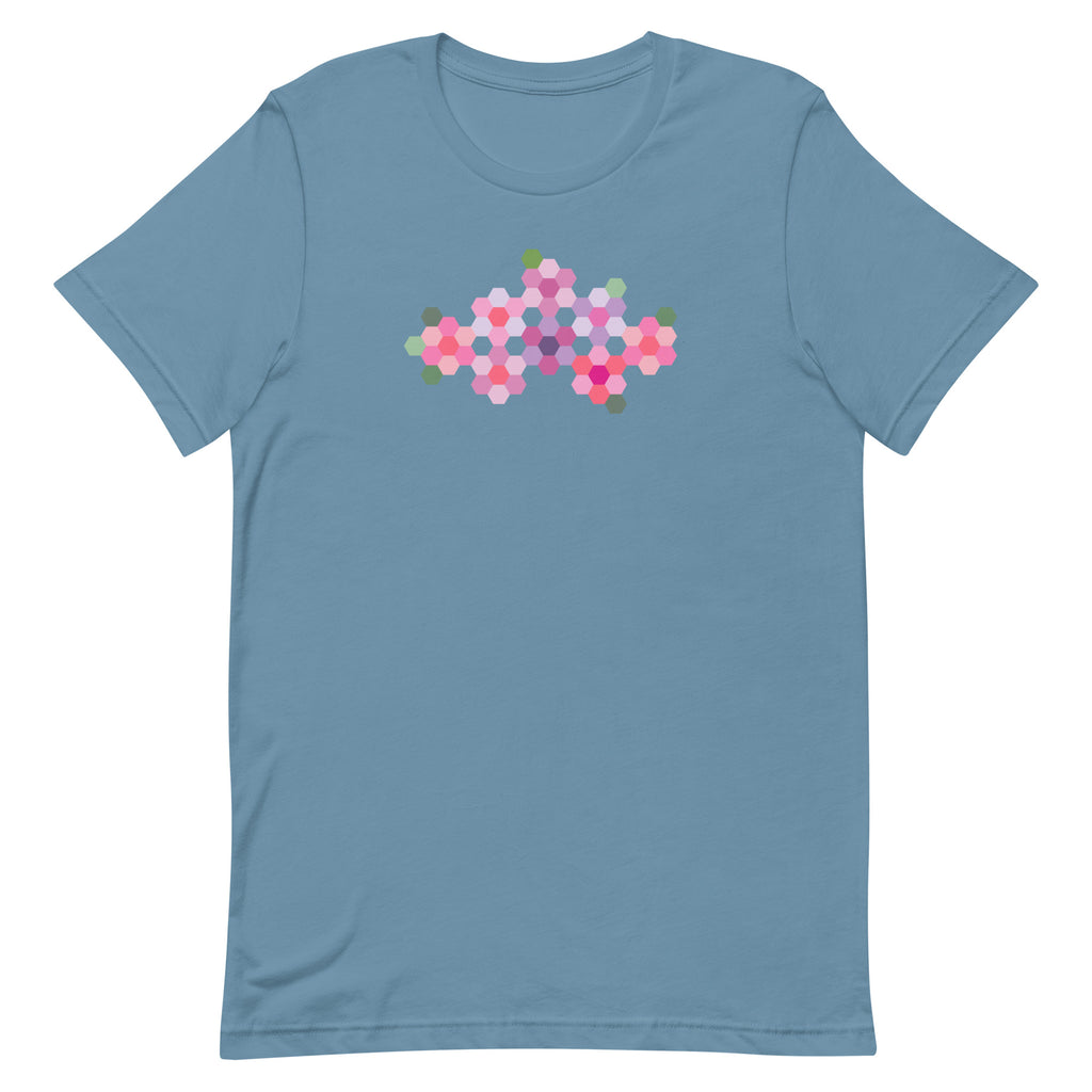 Pink GeoFlora hexagon flowers in pinks, mauves and sage on a t-shirt in steel blue, front view – Kate Spain design for Pat Sloan