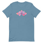 Pink GeoFlora hexagon flowers in pinks, mauves and sage on a t-shirt in steel blue, front view – Kate Spain design for Pat Sloan
