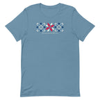 Firecracker quilt-block stars with script lettering in red, white and blue on a t-shirt in steel blue, front view – Kate Spain design for Pat Sloan