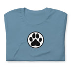 Law of the Paw® dog paw print on a t-shirt in steel blue, folded close-up of the design – Kate Spain design