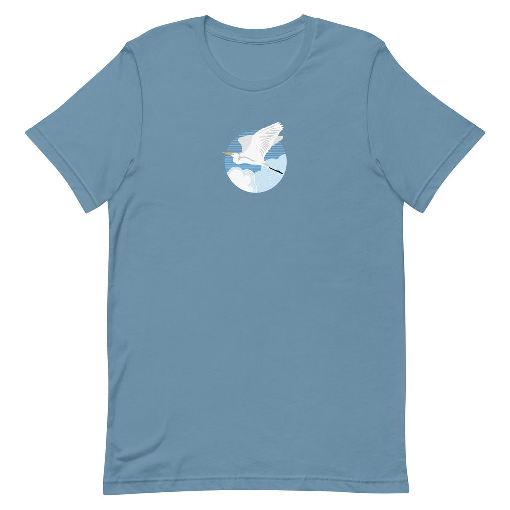 Great egret in flight against a blue circle on a t-shirt in steel blue, front view – Kate Spain design
