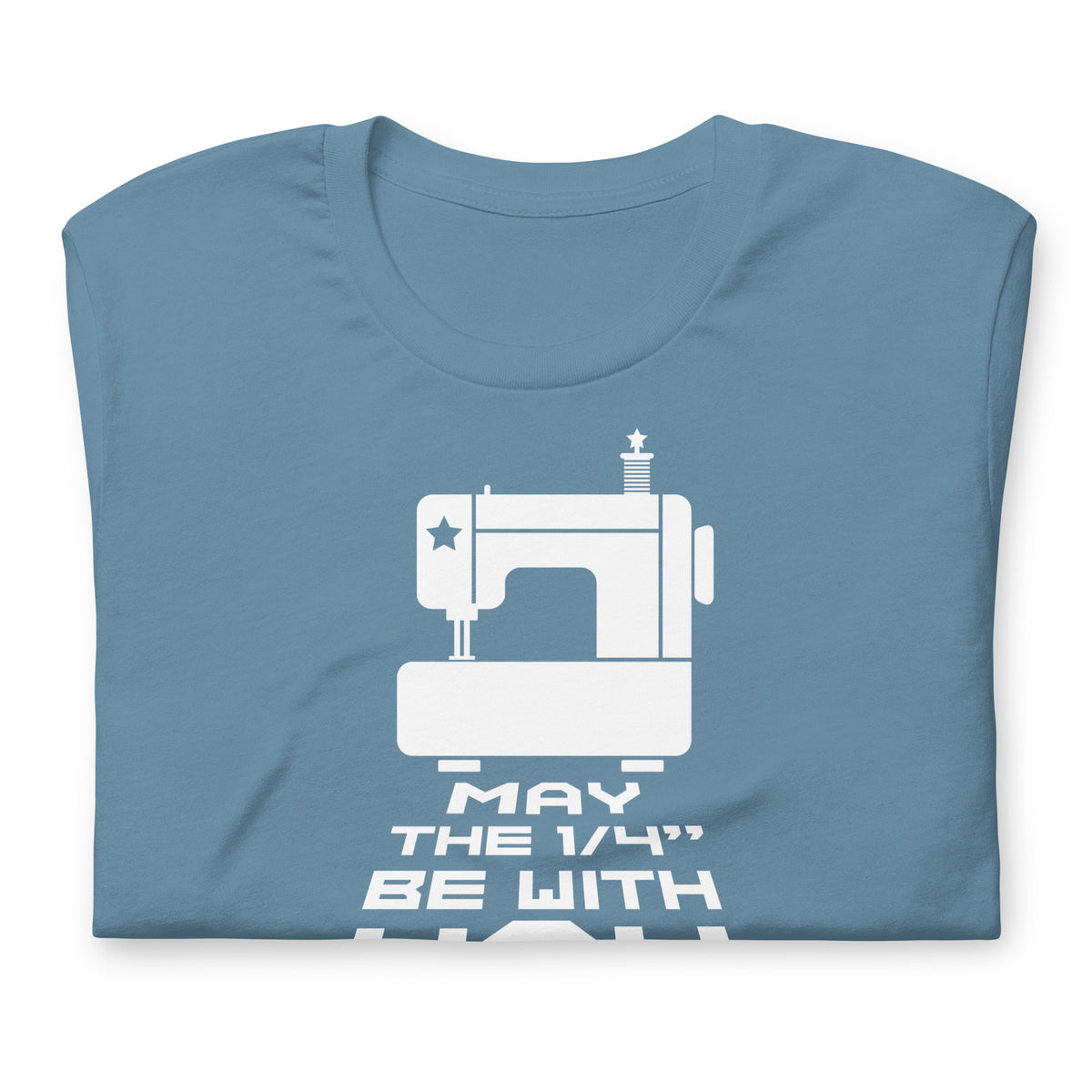 May the ¼" Be With You white sewing machine graphic on a staple t-shirt in steel blue, folded close-up of the design – Kate Spain design for Pat Sloan