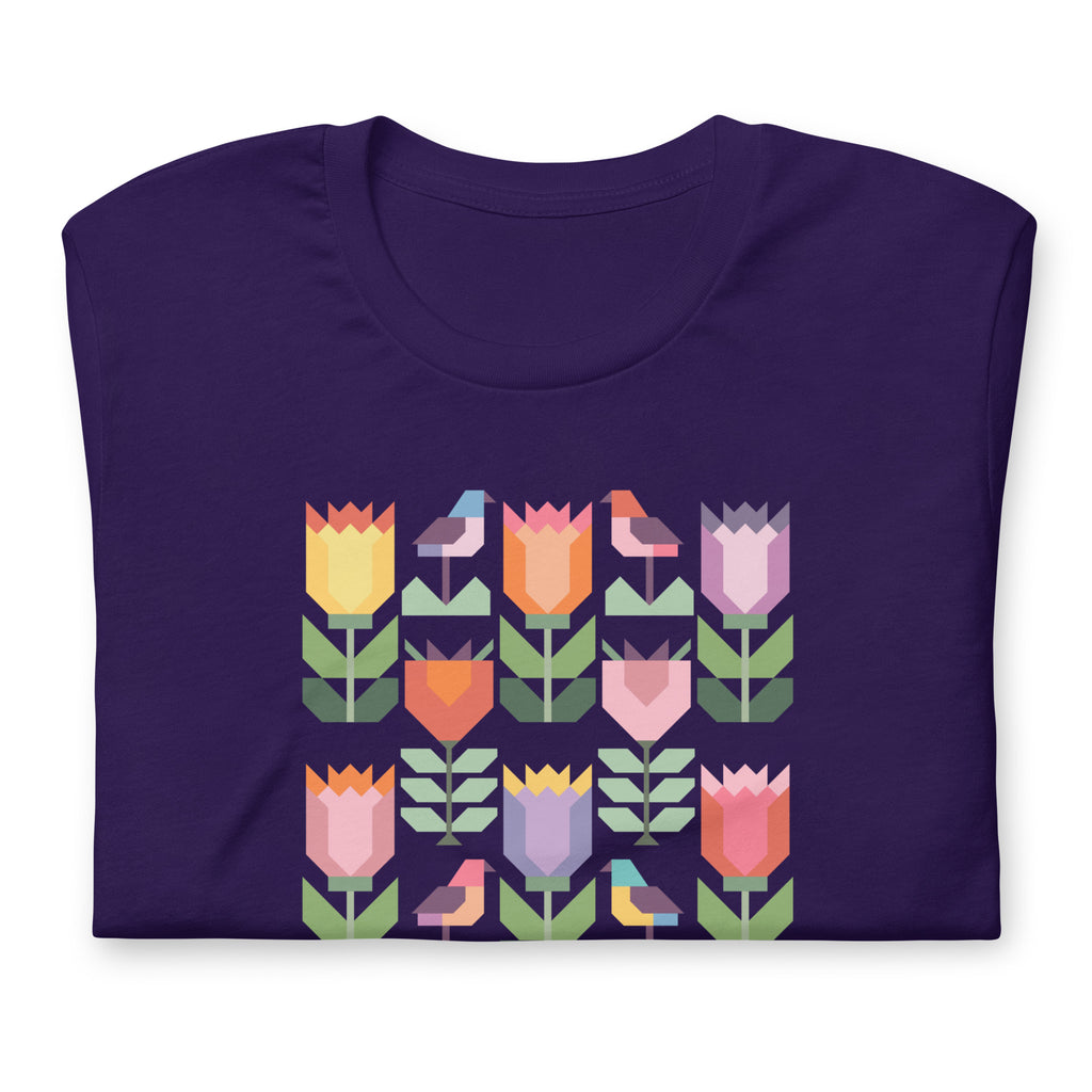 Birds + Blooms patchwork tulips and birds on a t-shirt in purple, folded close-up of the design – Kate Spain design for Pat Sloan