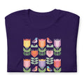 Birds + Blooms patchwork tulips and birds on a t-shirt in purple, folded close-up of the design – Kate Spain design for Pat Sloan