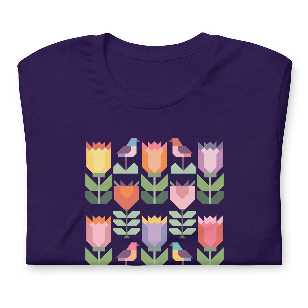 Birds + Blooms patchwork tulips and birds on a t-shirt in purple, folded close-up of the design – Kate Spain design for Pat Sloan