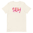 Sew Thankful patchwork lettering with a heart-topped thread spool on a t-shirt in vintage white, front view – Kate Spain design for Pat Sloan