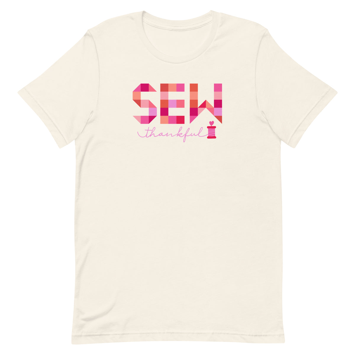 Sew Thankful patchwork lettering with a heart-topped thread spool on a t-shirt in vintage white, front view – Kate Spain design for Pat Sloan