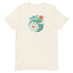 Dragonfly over water lilies and lily pads on a t-shirt in vintage white, folded close-up of the design – Kate Spain design