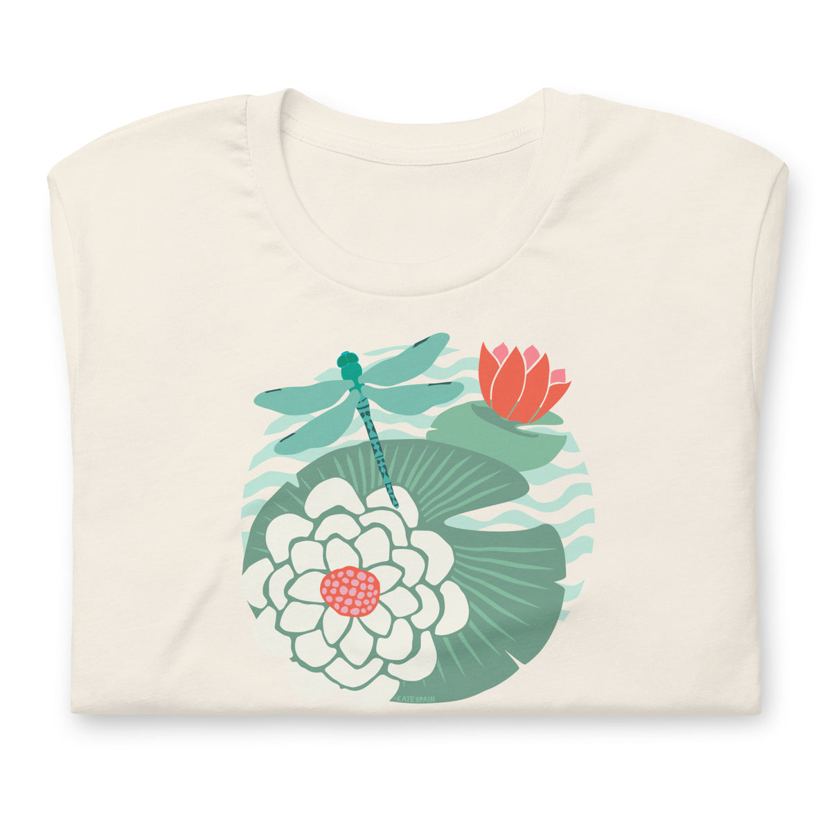 Dragonfly over water lilies and lily pads on a t-shirt in vintage white, front view – Kate Spain design