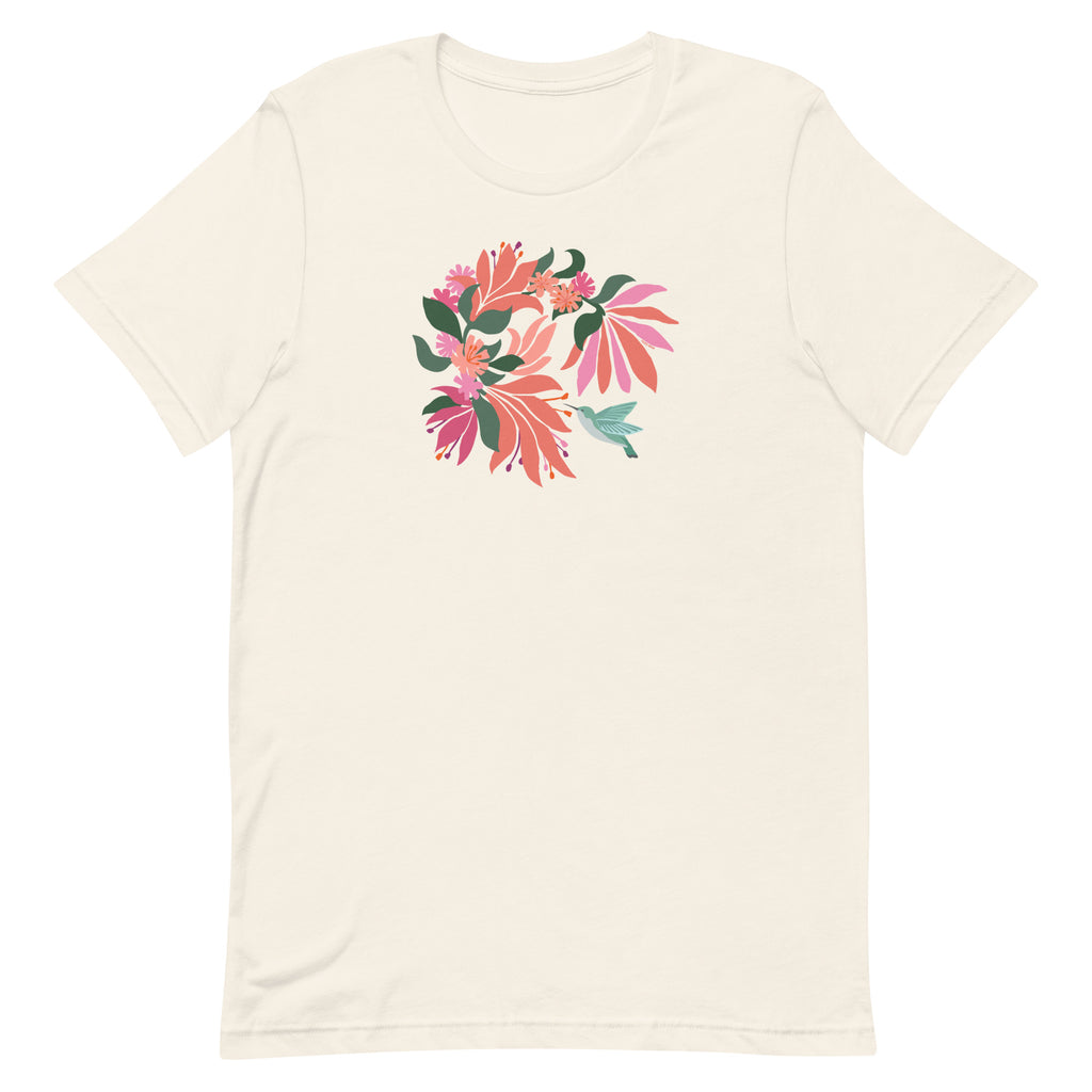 Hummingbird among coral tropical flowers on a t-shirt in vintage white, front view – Kate Spain design