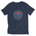 Fabric Curator Society of Stashers crest with a tomato pincushion on a unisex v-neck tee in navy, front view – Kate Spain design for Pat Sloan