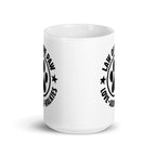 Law of the Paw® Love Adore Walkies white 15 oz ceramic mug with circular paw print badge, front view – Kate Spain design