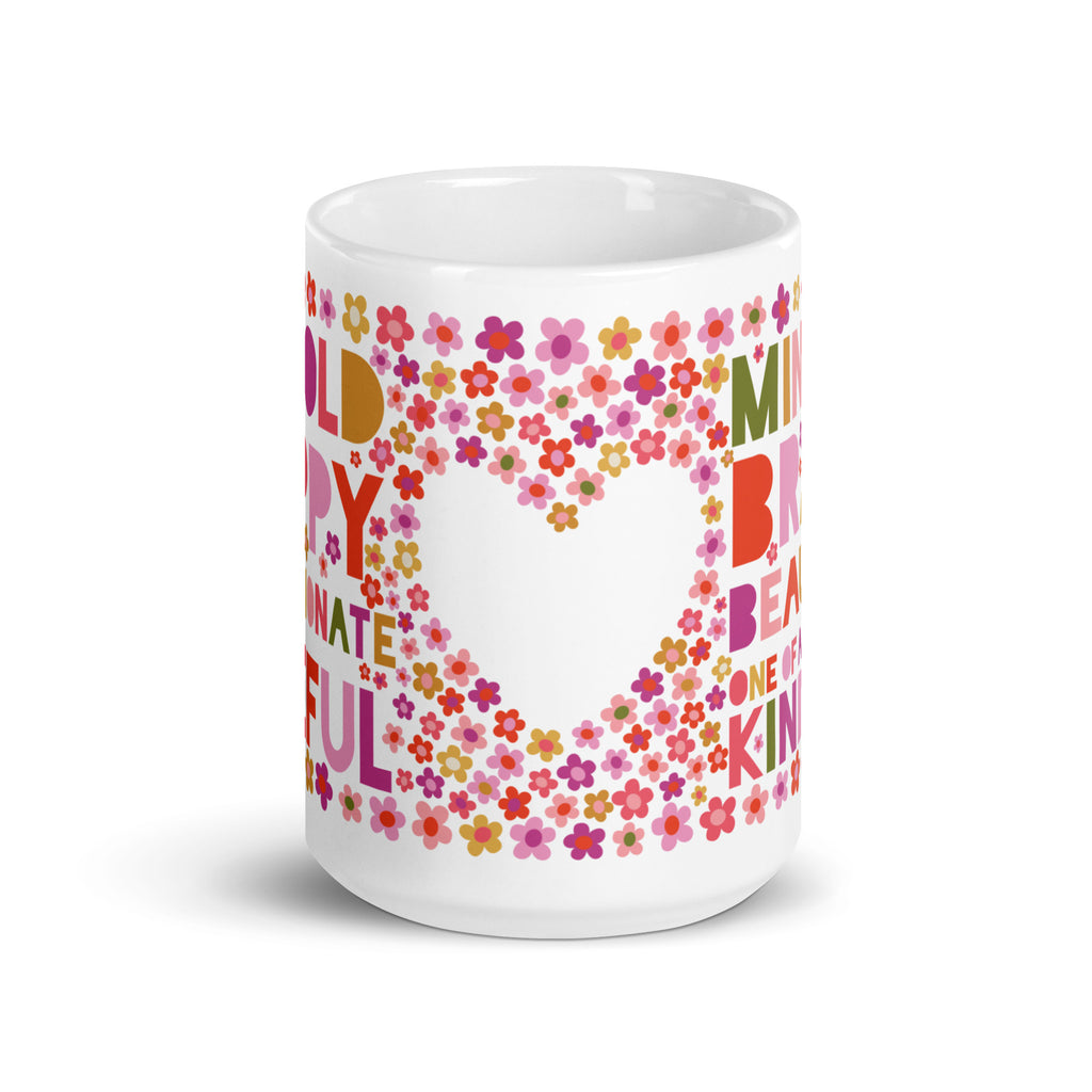 Be You 15 oz ceramic mug, front view of a white heart framed by tiny pink, red and gold flowers – Kate Spain design