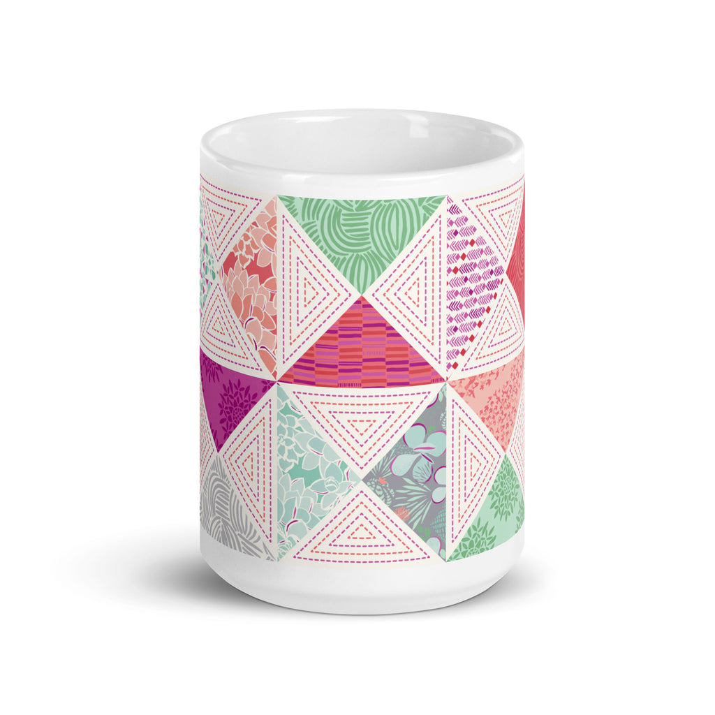 Canyon 15 oz ceramic mug with pink, green and coral quilt-block triangles, front view – Kate Spain design