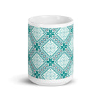 Chalet Turquoise 15 oz ceramic mug with teal Nordic diamond and snowflake pattern, front view – Kate Spain design