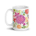 Terrain 15 oz ceramic mug with bold hot pink, orange and aqua flowers with ferns and “today is a good day” in the center flower, handle on the left – Kate Spain design