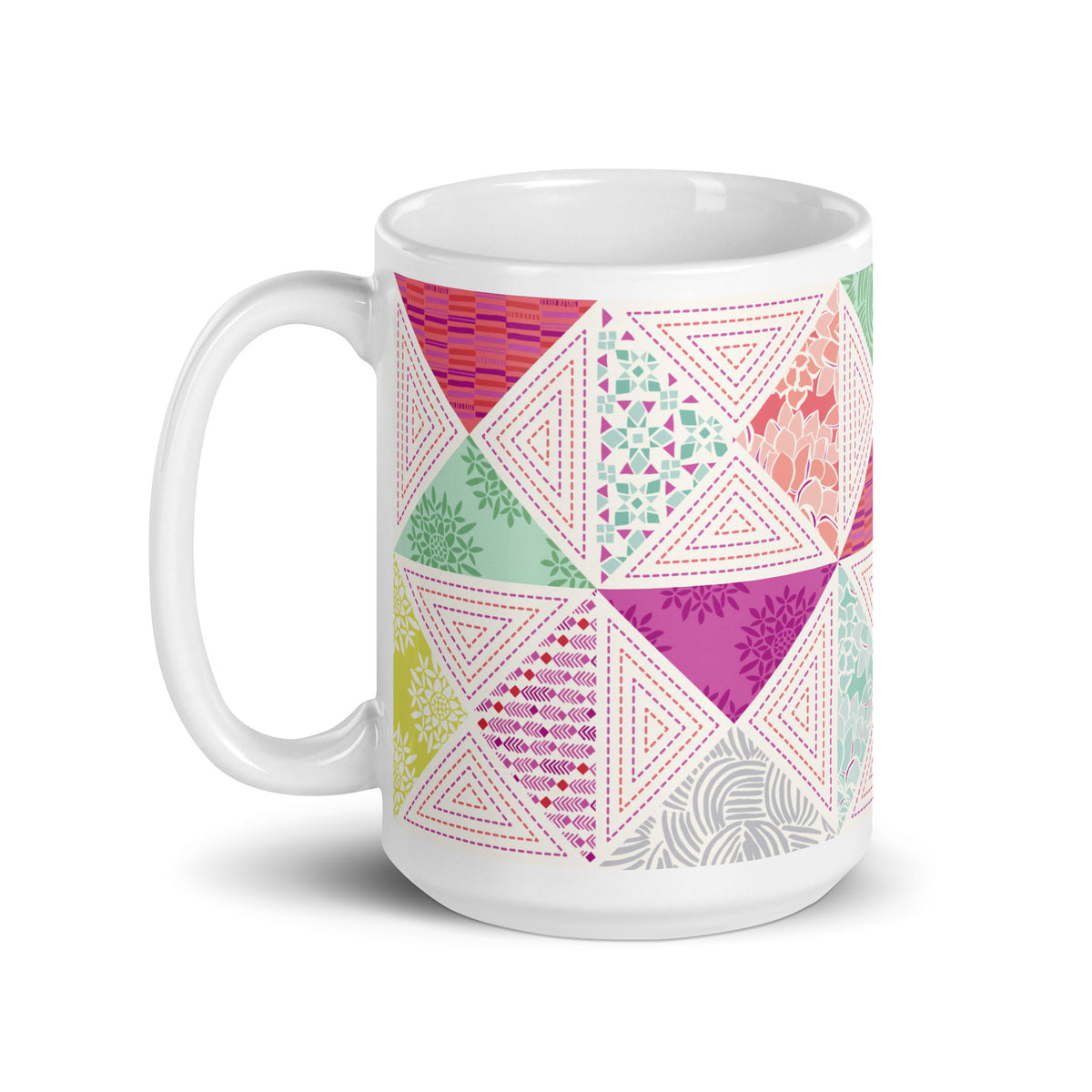 Canyon 15 oz ceramic mug with pink, green and coral quilt-block triangles, handle on the left – Kate Spain design