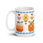 15 oz ceramic mug with the Falling for Fall patchwork pumpkin, quilt-block stars and hearts, handle on the left – Kate Spain design for Pat Sloan