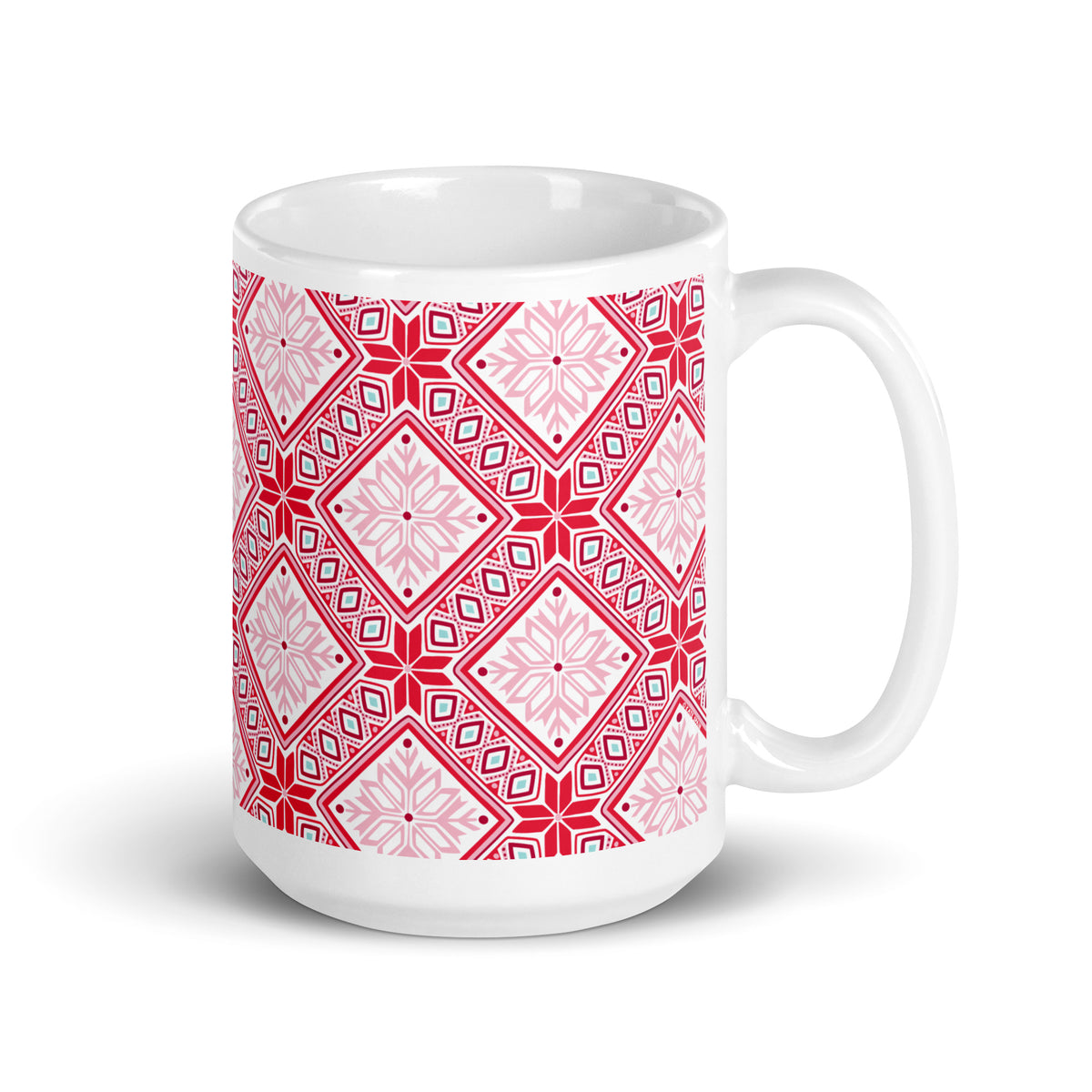 Chalet 15 oz ceramic mug with red and pink Nordic diamond and snowflake pattern, handle on the right – Kate Spain design