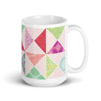 Canyon 15 oz ceramic mug with pink, green and coral quilt-block triangles, handle on the right – Kate Spain design