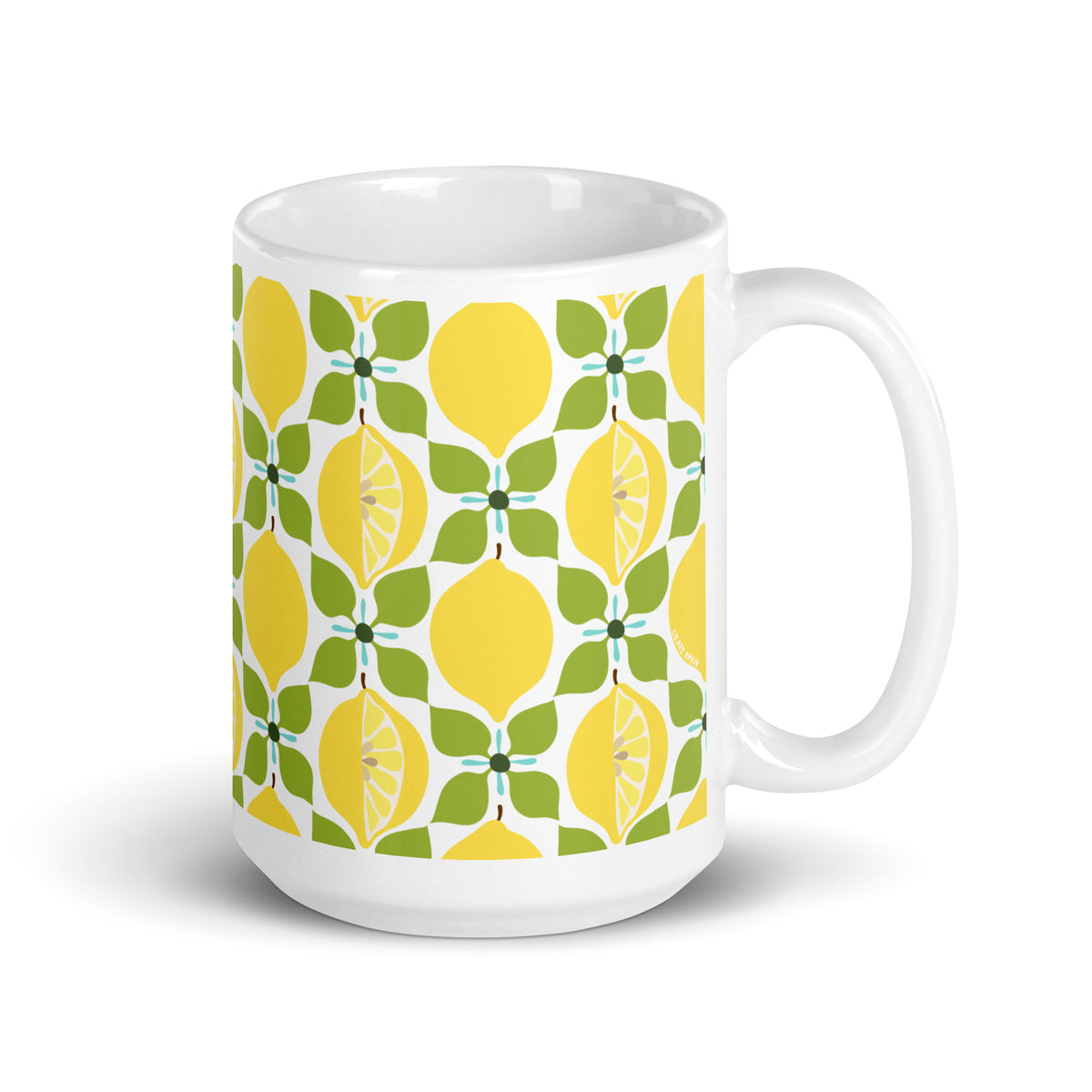 Lemon 15 oz ceramic mug with yellow lemons on a green leaf lattice, handle on the right – Kate Spain design
