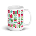 Happy Thoughts 15 oz ceramic mug wrapped in words like joy, peace, love, friends and quilt in red, green and aqua, handle on the right – Kate Spain design for Pat Sloan